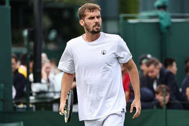Oscar Otte, GER, during first round of 2023 All England Lawn Tennis Championships at Wimbledon, gentlemens singles, London, 03 07 2023