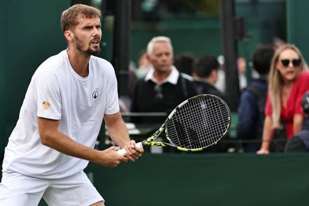 Oscar Otte, GER, during first round of 2023 All England Lawn Tennis Championships at Wimbledon, gentlemens singles, London, 03 07 2023
