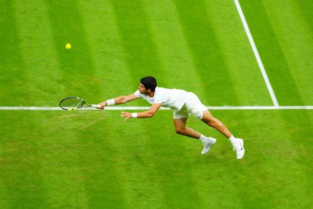 Mandatory Credit: Photo by Javier Garcia Shutterstock (13995877fe) Carlos Alcaraz during his first round match Wimbledon Tennis Championships, Day 2, The All England Lawn Tennis and Croquet Club, London, UK - 04 Jul 2023 Wimbledon Tennis Championships, Day 2, The All England Lawn Tennis and Croquet Club, London, UK - 04 Jul 2023  Copyright: xJavierxGarcia Shutterstockx 13995877fe
