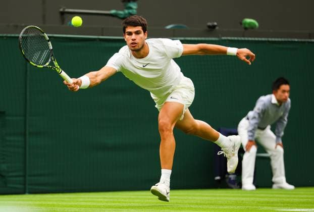 Mandatory Credit: Photo by Ella Ling Shutterstock (13995851ao) Carlos Alcaraz Wimbledon Tennis Championships, Day 2, The All England Lawn Tennis and Croquet Club, London, UK - 04 Jul 2023 Wimbledon Tennis Championships, Day 2, The All England Lawn Tennis and Croquet Club, London, UK - 04 Jul 2023  Copyright: xEllaxLing Shutterstockx 13995851ao