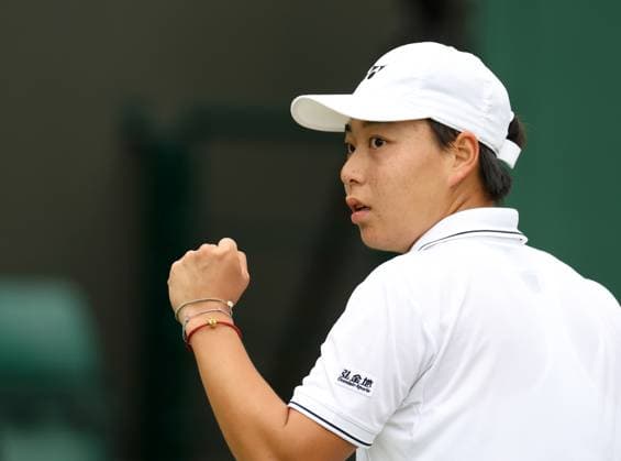 (230704) -- LONDON, July 4, 2023 -- Bai Zhuoxuan celebrates scoring during the women s singles first round match between Bai Zhuoxuan of China and Ysaline Bonaventure of Belgium at Wimbledon Tennis Championships in London, Britain, July 4, 2023. ) (SP)BRITAIN-LONDON-TENNIS-WIMBLEDON-DAY 2 LixYing 