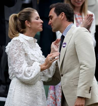 (230704) -- LONDON, July 4, 2023 -- Roger Federer (R) and his wife Mirka Federer are seen at Centre Court ahead of play on Day 2 of Wimbledon Tennis Championships in London, Britain, July 4, 2023. ) (SP)BRITAIN-LONDON-TENNIS-WIMBLEDON-ROGER FEDERER LixYing 