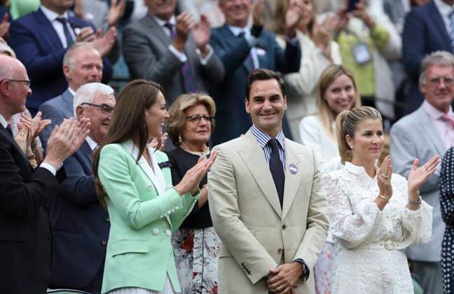 (230704) -- LONDON, July 4, 2023 -- Roger Federer (front C) stands with Britain s Catherine (front L), Princess of Wales, and his wife Mirka Federer (front R) at Centre Court ahead of play on Day 2 of Wimbledon Tennis Championships in London, Britain, July 4, 2023. ) (SP)BRITAIN-LONDON-TENNIS-WIMBLEDON-ROGER FEDERER HanxYan 