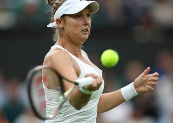 (230704) -- LONDON, July 4, 2023 -- Shelby Rogers hits a return during the women s singles first round match between Shelby Rogers of the United States and Elena Rybakina of Kazakhstan at Wimbledon Tennis Championships in London, Britain, July 4, 2023. ) (SP)BRITAIN-LONDON-TENNIS-WIMBLEDON-DAY 2 HanxYan 