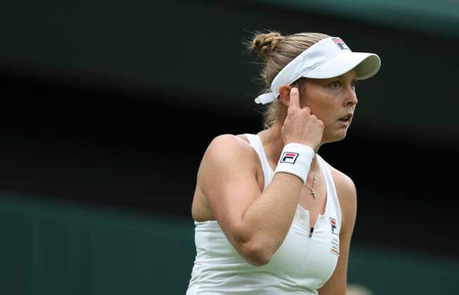 (230704) -- LONDON, July 4, 2023 -- Shelby Rogers reacts during the women s singles first round match between Shelby Rogers of the United States and Elena Rybakina of Kazakhstan at Wimbledon Tennis Championships in London, Britain, July 4, 2023. ) (SP)BRITAIN-LONDON-TENNIS-WIMBLEDON-DAY 2 HanxYan 