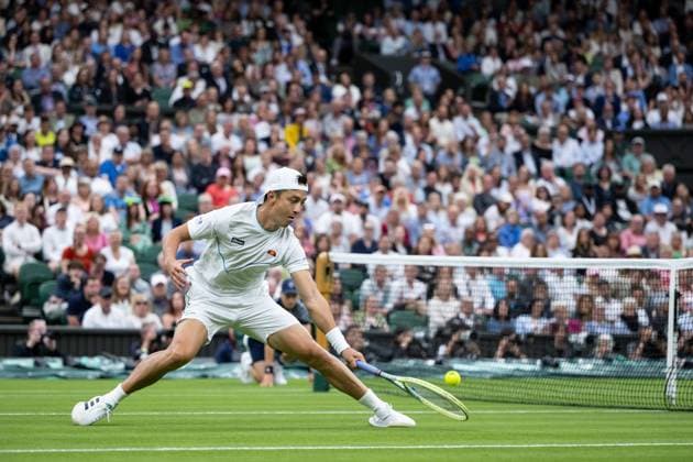230704 Ryan Peniston of Great Britain competes in a first round singles tennis match against Andy Murray of Great Britain during day 2 of Wimbledon on July 4, 2023 in London Photo Jesper Zerman BILDBYRAN COP 234 JZ0390 tennis wimbledon day 2 bbeng  Copyright: JESPERxZERMAN BB230704JZ064