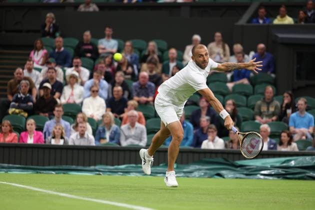 4th July 2023; All England Lawn Tennis and Croquet Club, London, England: Wimbledon Tennis Tournament Day 1; Mens singles match as Dan Evans resumes on Centre Court two sets down against Quentin Halys  ActionPlus12527141 ShaunxBrooks