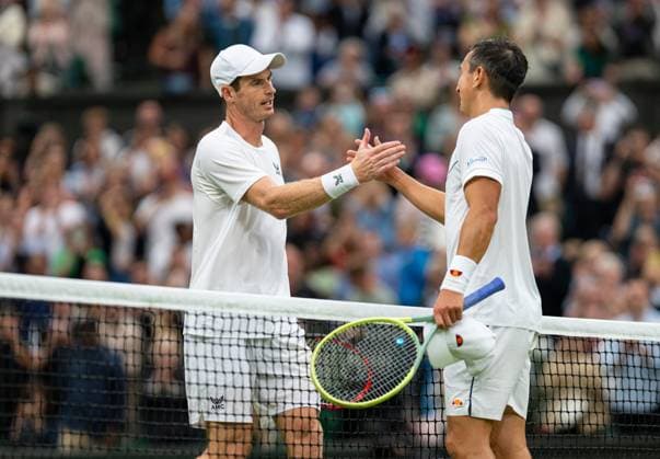 Tennis - Wimbledon Championship 2023 - Day 2 LONDON, ENGLAND - Tuesday, July 4, 2023: Andy Murray (GBR) (L) shakes hands with Ryan Peniston (GBR) after the Gentlemen s Singles 1st Round match on Day Two of The Championships Wimbledon 2023 at the All England Lawn Tennis and Croquet Club. LONDON All England Lawn Tennis and Croq GREATER LONDON ENGLAND  Copyright: xKirstenxHolstx P2023-07-04-Wimbledon_Day_2-17