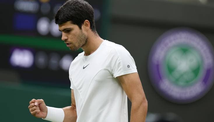 (230705) -- LONDON, July 5, 2023 -- Carlos Alcaraz of Spain celebrates during the men s singles first round match against Jeremy Chardy of France at Wimbledon Tennis Championships in London, Britain, July 4, 2023. ) (SP)BRITAIN-LONDON-TENNIS-WIMBLEDON-DAY 2 LixYing 