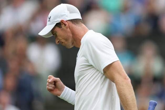(230705) -- LONDON, July 5, 2023 -- Andy Murray of Britain celebrates during the men s singles first round match against Ryan Peniston of Britain at Wimbledon tennis Championships in London, Britain, on July 4, 2023. ) (SP)BRITAIN-LONDON-TENNIS-WIMBLEDON-DAY 2 HanxYan 