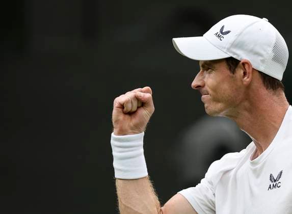(230705) -- LONDON, July 5, 2023 -- Andy Murray of Britain celebrates during the men s singles first round match against Ryan Peniston of Britain at Wimbledon tennis Championships in London, Britain, on July 4, 2023. ) (SP)BRITAIN-LONDON-TENNIS-WIMBLEDON-DAY 2 HanxYan 