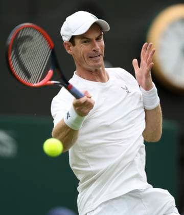 (230705) -- LONDON, July 5, 2023 -- Andy Murray of Britain returns a shot during the men s singles first round match against Ryan Peniston of Britain at Wimbledon tennis Championships in London, Britain, on July 4, 2023. ) (SP)BRITAIN-LONDON-TENNIS-WIMBLEDON-DAY 2 HanxYan 