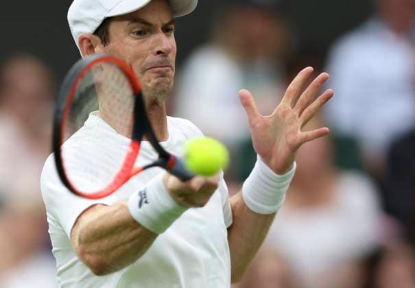 (230705) -- LONDON, July 5, 2023 -- Andy Murray of Britain returns a shot during the men s singles first round match against Ryan Peniston of Britain at Wimbledon tennis Championships in London, Britain, on July 4, 2023. ) (SP)BRITAIN-LONDON-TENNIS-WIMBLEDON-DAY 2 HanxYan 