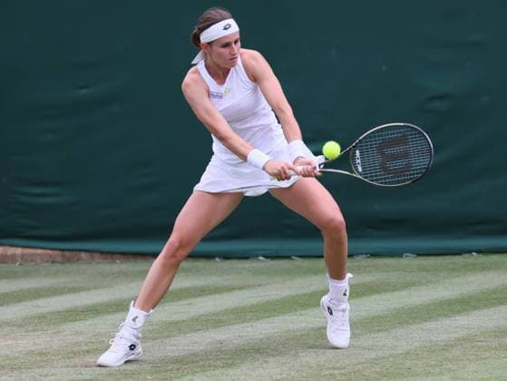 Belgian Greet Minnen pictured in action during a tennis match against Latvian Ostapenko, in the first round of the Women s Singles at the 2023 Wimbledon grand slam tennis tournament at the All England Tennis Club, in south-west London, Britain, Wednesday 05 July 2023. BENOITxDOPPAGNE  x70135447x