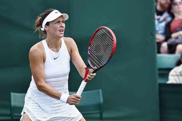Tatjana Maria, GER, during rain delayed first round of 2023 All England Lawn Tennis Championships at Wimbledon, womens singles, London, 05 07 2023