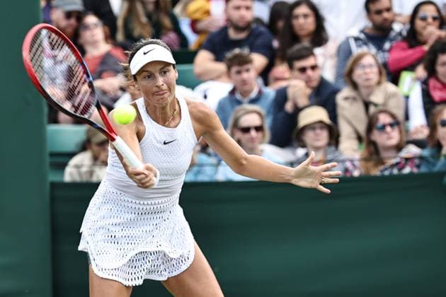 Tatjana Maria, GER, during rain delayed first round of 2023 All England Lawn Tennis Championships at Wimbledon, womens singles, London, 05 07 2023