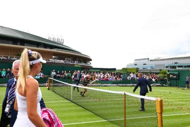 Mandatory Credit: Photo by Simon Dael Shutterstock (13995914ci) Just Stop oil protesters disrupt the match between Katie Boulter and Daria Saville as Boulter looks on Wimbledon Tennis Championships, Day 3, The All England Lawn Tennis and Croquet Club, London, UK - 05 Jul 2023 Wimbledon Tennis Championships, Day 3, The All England Lawn Tennis and Croquet Club, London, UK - 05 Jul 2023  Copyright: xSimonxDael Shutterstockx 13995914ci