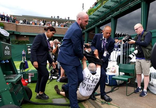 Mandatory Credit: Photo by Simon Dael Shutterstock (13995914cp) Just Stop oil protesters disrupt the match between Katie Boulter and Daria Saville Wimbledon Tennis Championships, Day 3, The All England Lawn Tennis and Croquet Club, London, UK - 05 Jul 2023 Wimbledon Tennis Championships, Day 3, The All England Lawn Tennis and Croquet Club, London, UK - 05 Jul 2023  Copyright: xSimonxDael Shutterstockx 13995914cp