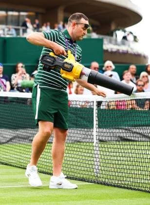 Mandatory Credit: Photo by Simon Dael Shutterstock (13995914cv) Leaf blowers are employed to clear the court after a Just Stop oil protest Wimbledon Tennis Championships, Day 3, The All England Lawn Tennis and Croquet Club, London, UK - 05 Jul 2023 Wimbledon Tennis Championships, Day 3, The All England Lawn Tennis and Croquet Club, London, UK - 05 Jul 2023  Copyright: xSimonxDael Shutterstockx 13995914cv
