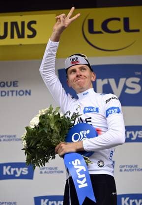 Slovenian Tadej Pogacar of UAE Team Emirates celebrates on the podium in the white jersey for best young rider after stage 5 of the Tour de France cycling race, a 162,7 km race from Pau to Laruns, France, Wednesday 05 July 2023. This year s Tour de France takes place from 01 to 23 July 2023. DIRKxWAEM  x70136947x