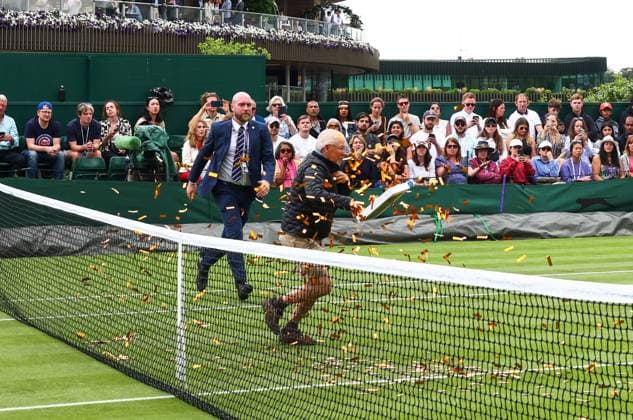 Mandatory Credit: Photo by Simon Dael Shutterstock (13995914dm) Just Stop oil protesters disrupt the match between Katie Boulter and Daria Saville Wimbledon Tennis Championships, Day 3, The All England Lawn Tennis and Croquet Club, London, UK - 05 Jul 2023 Wimbledon Tennis Championships, Day 3, The All England Lawn Tennis and Croquet Club, London, UK - 05 Jul 2023  Copyright: xSimonxDael Shutterstockx 13995914dm