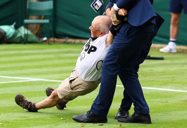 Mandatory Credit: Photo by Simon Dael Shutterstock (13995914do) Just Stop oil protesters disrupt the match between Katie Boulter and Daria Saville Wimbledon Tennis Championships, Day 3, The All England Lawn Tennis and Croquet Club, London, UK - 05 Jul 2023 Wimbledon Tennis Championships, Day 3, The All England Lawn Tennis and Croquet Club, London, UK - 05 Jul 2023  Copyright: xSimonxDael Shutterstockx 13995914do