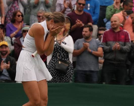 Tennis - 2023 Wimbledon Championships - Week One - Day Three - All England Lawn Tennis & Croquet Club, Wimbledon - Wednesday 5th July 2023 Maria Sakkari (GRE) v Marta Kostyuk (UKR) Marta Kostyuk (UKR) celebrates winning match point 