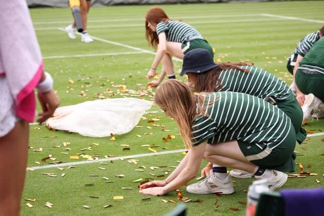 5th July 2023; All England Lawn Tennis and Croquet Club, London, England: Wimbledon Tennis Tournament; The Wimbledon ground staff clean up the Just Oil protest glitter  ActionPlus12527315 ShaunxBrooks