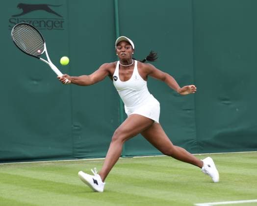 American Sloane Stephens plays a forehand in her first round match against Sweden s Rebecca Peterson on day three of the 2023 Wimbledon championships in London on Wednesday, July 05, 2023.  LON2023070516 HUGOxPHILPOTT