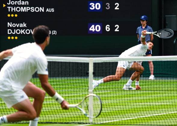 Mandatory Credit: Photo by Javier Garcia Shutterstock (13995913en) Novak Djokovic and Jordan Thompson during their second round match Wimbledon Tennis Championships, Day 3, The All England Lawn Tennis and Croquet Club, London, UK - 05 Jul 2023 Wimbledon Tennis Championships, Day 3, The All England Lawn Tennis and Croquet Club, London, UK - 05 Jul 2023  Copyright: xJavierxGarcia Shutterstockx 13995913en
