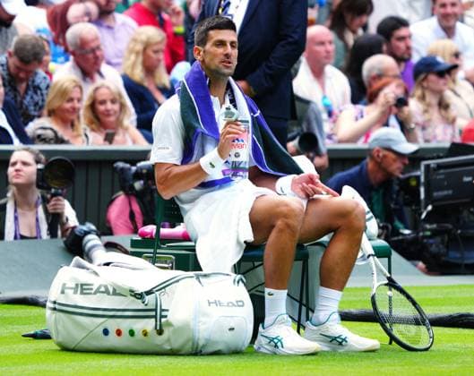 Mandatory Credit: Photo by Javier Garcia Shutterstock (13995913et) Novak Djokovic between games in his second round match Wimbledon Tennis Championships, Day 3, The All England Lawn Tennis and Croquet Club, London, UK - 05 Jul 2023 Wimbledon Tennis Championships, Day 3, The All England Lawn Tennis and Croquet Club, London, UK - 05 Jul 2023  Copyright: xJavierxGarcia Shutterstockx 13995913et