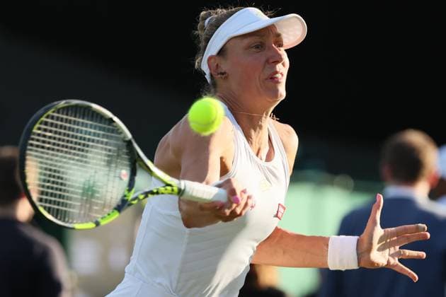 Belgian Yanina Wickmayer pictured in action during the match between Belgian Wickmayer and Russian Blinkova, in the Women s Singles First Round, at the 2023 Wimbledon grand slam tennis tournament at the All England Tennis Club, in south-west London, Britain, . BENOITxDOPPAGNE  x70147256x