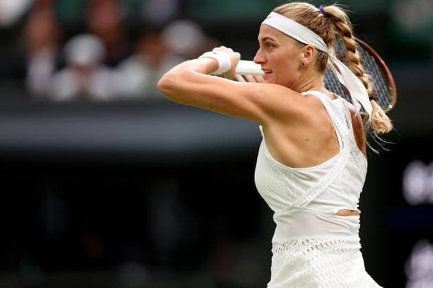 5th July 2023; All England Lawn Tennis and Croquet Club, London, England: Wimbledon Tennis Tournament; Petra Kvitova plays a backhand shot to Jasmine Paolini  ActionPlus12527347 ShaunxBrooks
