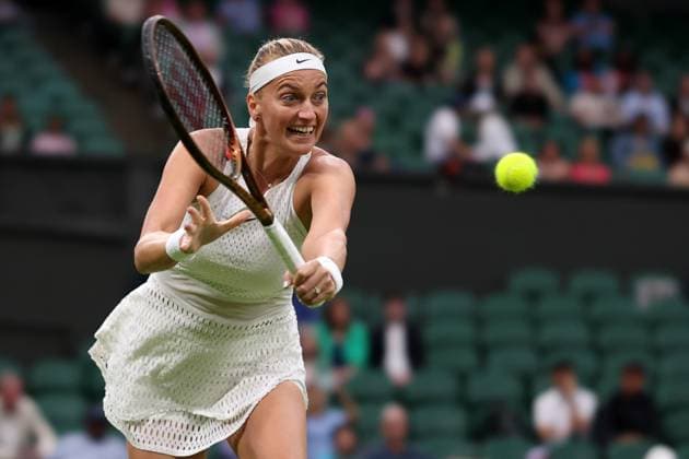 5th July 2023; All England Lawn Tennis and Croquet Club, London, England: Wimbledon Tennis Tournament; Petra Kvitova plays a backhand shot to Jasmine Paolini  ActionPlus12527485 ShaunxBrooks