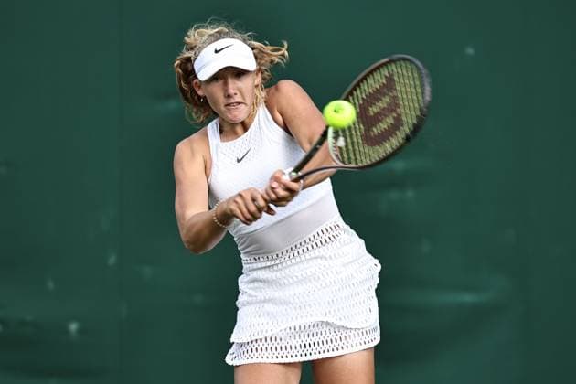 Mirra Andreeva, RUS, during rain delayed first round of 2023 All England Lawn Tennis Championships at Wimbledon, womens singles, London, 05 07 2023