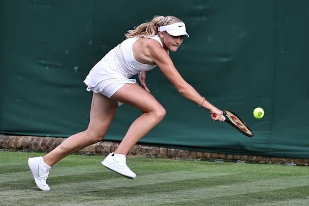 Mirra Andreeva, RUS, during rain delayed first round of 2023 All England Lawn Tennis Championships at Wimbledon, womens singles, London, 05 07 2023