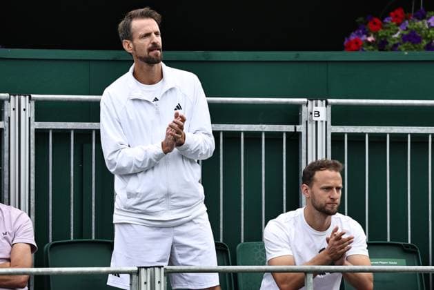 Christopher Kas left, coach of Jule Niemeier, GER during rain delayed first round of 2023 All England Lawn Tennis Championships at Wimbledon, womens singles, London, 06 07 2023