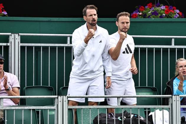 Christopher Kas left, coach of Jule Niemeier, GER during rain delayed first round of 2023 All England Lawn Tennis Championships at Wimbledon, womens singles, London, 06 07 2023