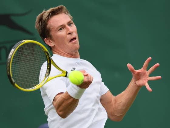 Belgian Kimmer Coppejans pictured in action during the second part of the match between Belgian Coppejans and Australian De Minaur, in the Men s Singles First Round, at the 2023 Wimbledon grand slam tennis tournament at the All England Tennis Club, in south-west London, Britain, . Due to the bad weather, play had to be suspended on Tuesday and Wednesday, and lots of matches had to be postponed. BENOITxDOPPAGNE  x70178206x