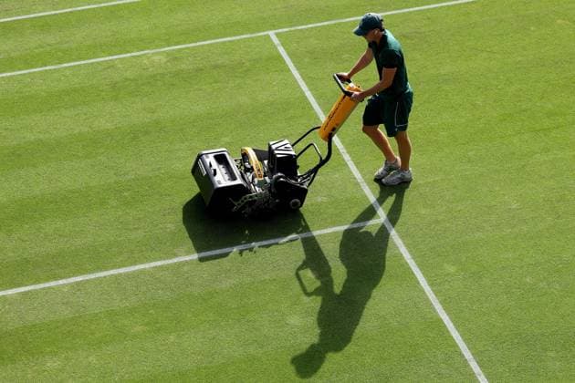 6th July 2023; All England Lawn Tennis and Croquet Club, London, England: Wimbledon Tennis Tournament; A Wimbledon groundsman cuts the tennis court pre-games  ActionPlus12527509 ShaunxBrooks
