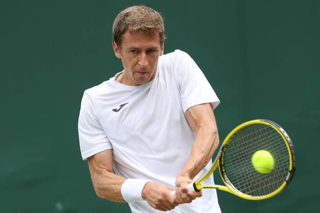 Great Britain, London, All England Lawn Tennis Club, The Championships Wimbledon 2023 - DAY 4- 6 07 2023 Belgian player Kimmer Koppejans (BEL) pictured during his first round against No.16 seed Alex De Minaur (AUS) in London , All England Lawn Tennis Club at The Championships Wimbledon 2023 The Championships Wimbledon 2023- DAY 4- 06 07 2023 PhotoNews Panoramic 