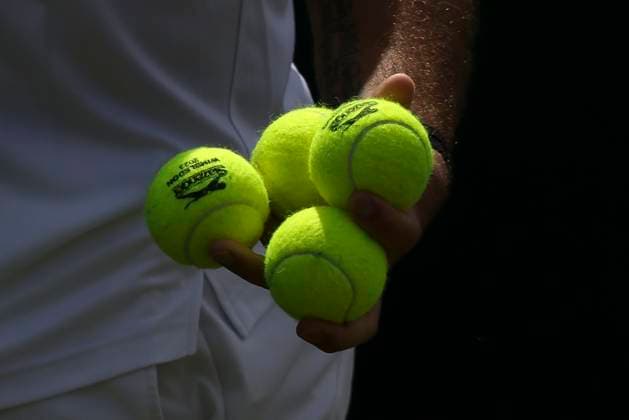 (230706) -- LONDON, July 6, 2023 -- Stan Wawrinka prepares to serve during the men s singles second round match between Tomas Martin Etcheverry of Argentina and Stan Wawrinka of Switzerland at Wimbledon Tennis Championships in London, Britain, July 6, 2023. ) (SP)BRITAIN-LONDON-TENNIS-WIMBLEDON-DAY 4 HanxYan 