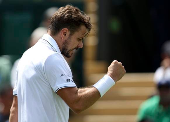 (230706) -- LONDON, July 6, 2023 -- Stan Wawrinka reacts during the men s singles second round match between Tomas Martin Etcheverry of Argentina and Stan Wawrinka of Switzerland at Wimbledon Tennis Championships in London, Britain, July 6, 2023. ) (SP)BRITAIN-LONDON-TENNIS-WIMBLEDON-DAY 4 HanxYan 