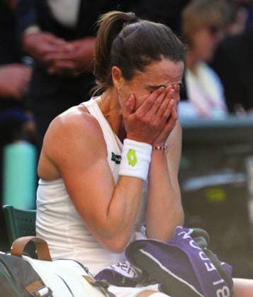 Mandatory Credit: Photo by Javier Garcia Shutterstock (13995919gj) Alize Cornet in tears after a fall during her second round match Wimbledon Tennis Championships, Day 4, The All England Lawn Tennis and Croquet Club, London, UK - 06 Jul 2023 Wimbledon Tennis Championships, Day 4, The All England Lawn Tennis and Croquet Club, London, UK - 06 Jul 2023  Copyright: xJavierxGarcia Shutterstockx 13995919gj