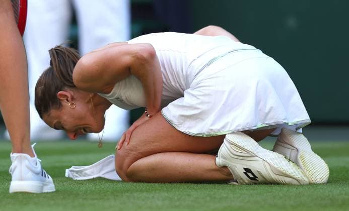 Mandatory Credit: Photo by Ella Ling Shutterstock (13995916cd) Alize Cornet in tears as she suffers an injury and receives treatment in their match vs Elena Rybakina Wimbledon Tennis Championships, Day 4, The All England Lawn Tennis and Croquet Club, London, UK - 06 Jul 2023 Wimbledon Tennis Championships, Day 4, The All England Lawn Tennis and Croquet Club, London, UK - 06 Jul 2023  Copyright: xEllaxLing Shutterstockx 13995916cd
