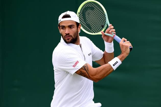 6th July 2023; All England Lawn Tennis and Croquet Club, London, England: Wimbledon Tennis Tournament; Matteo Berrettini plays a backhand shot to Lorenzo Sonego  ActionPlus12527762 ShaunxBrooks