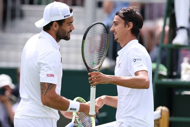 6th July 2023; All England Lawn Tennis and Croquet Club, London, England: Wimbledon Tennis Tournament; Matteo Berrettini embraces Lorenzo Sonego after he wins the match  ActionPlus12527781 ShaunxBrooks