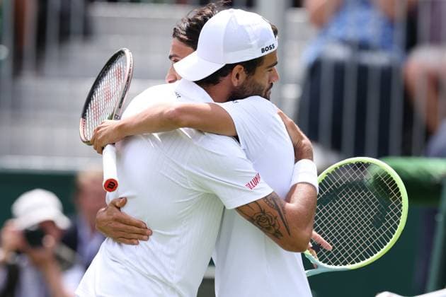 6th July 2023; All England Lawn Tennis and Croquet Club, London, England: Wimbledon Tennis Tournament; Matteo Berrettini embraces Lorenzo Sonego after he wins the match  ActionPlus12527782 ShaunxBrooks