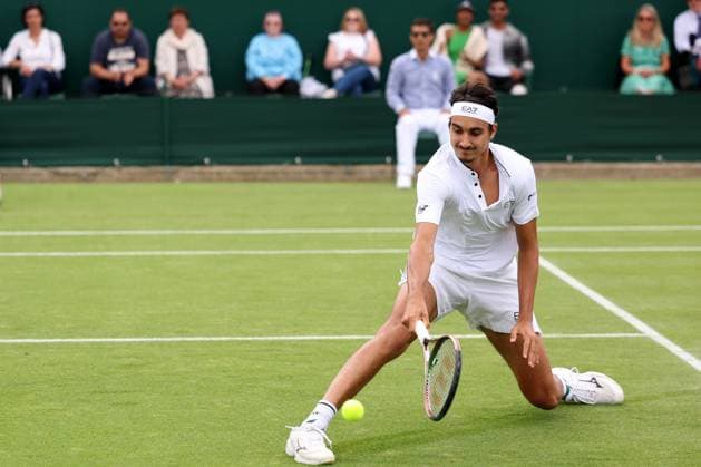 6th July 2023; All England Lawn Tennis and Croquet Club, London, England: Wimbledon Tennis Tournament; Lorenzo Sonego attempts a drop shot to Matteo Berrettini  ActionPlus12527774 ShaunxBrooks
