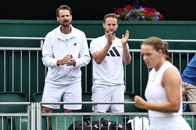 Christopher Kas left, coach of Jule Niemeier, GER during rain delayed first round of 2023 All England Lawn Tennis Championships at Wimbledon, womens singles, London, 06 07 2023